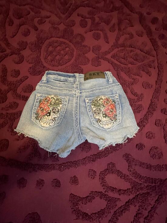 Sky Pants - skull embroidered denim shorts